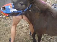 Pony fucks a kinky mature woman who loves bestiality sex